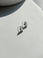 Load image into Gallery viewer, Roxy Curved Square Earrings in Silver
